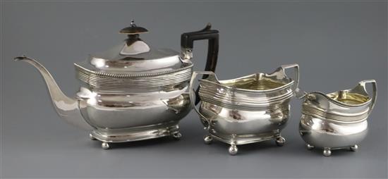 A matched George III silver three piece tea set, gross 30.5 oz.